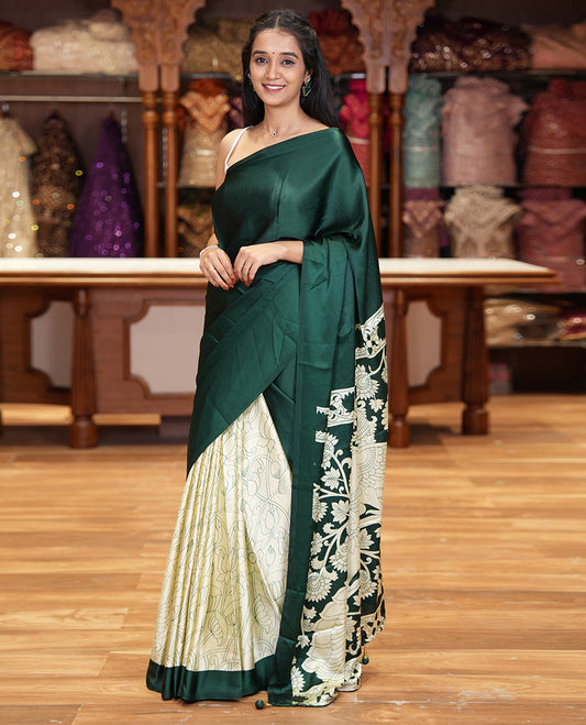 Chikku-green half-and-half plain and kalamkari floral printed satin crepe saree, plain border, pallu of floral vine and peacock printed, and kalamkari floral printed blouse