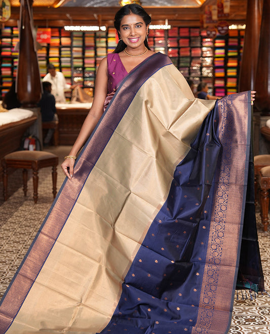 Navy Litchi Saree, Adorned with Half-And-Half and Zari Buttas, Contrast Traditional Zari Border, Grand Pallu, and a Contrast Blouse