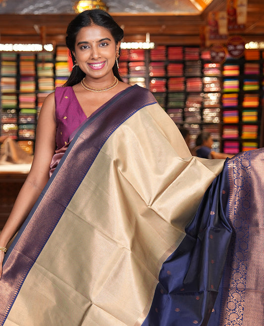 Navy Litchi Saree, Adorned with Half-And-Half and Zari Buttas, Contrast Traditional Zari Border, Grand Pallu, and a Contrast Blouse