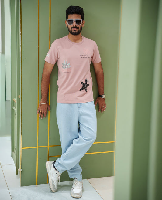 Pink Cotton-Blended T-Shirt, Comes with Tropical Floral-Star Motifs Print, a Crew Neck, Half Sleeves, Slim Fit, and Regular Length