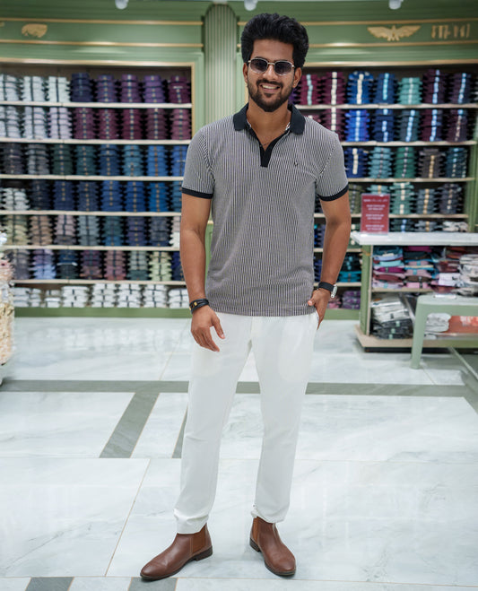 Black Striped Cotton-Blended T-Shirt Comes with Half-Sleeves, a Polo Collar, a Slim Fit, and Regular Length