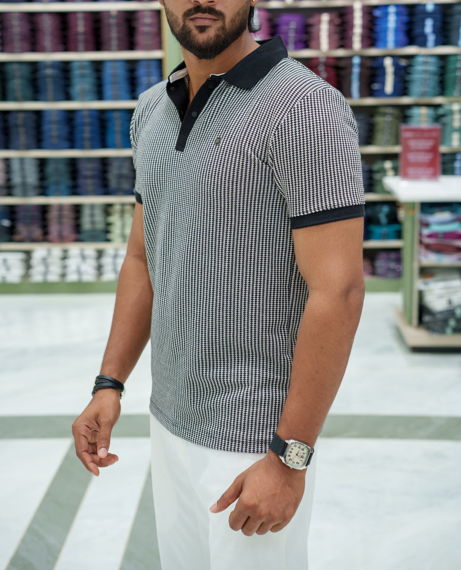 Black Striped Cotton-Blended T-Shirt Comes with Half-Sleeves, a Polo Collar, a Slim Fit, and Regular Length