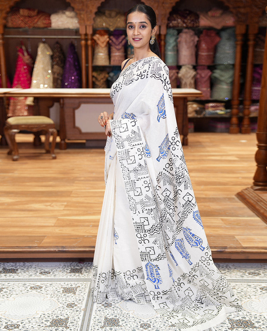 White peacock block printed mul cotton saree, geometric printed border, geometric printed pallu, and a matching block printed blouse