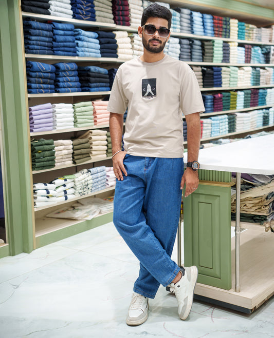 Cream Cotton-Blended T-shirt, Features Unique Back Print, Half-sleeves, Crew Neck, Oversized Fit, and Regular Length 