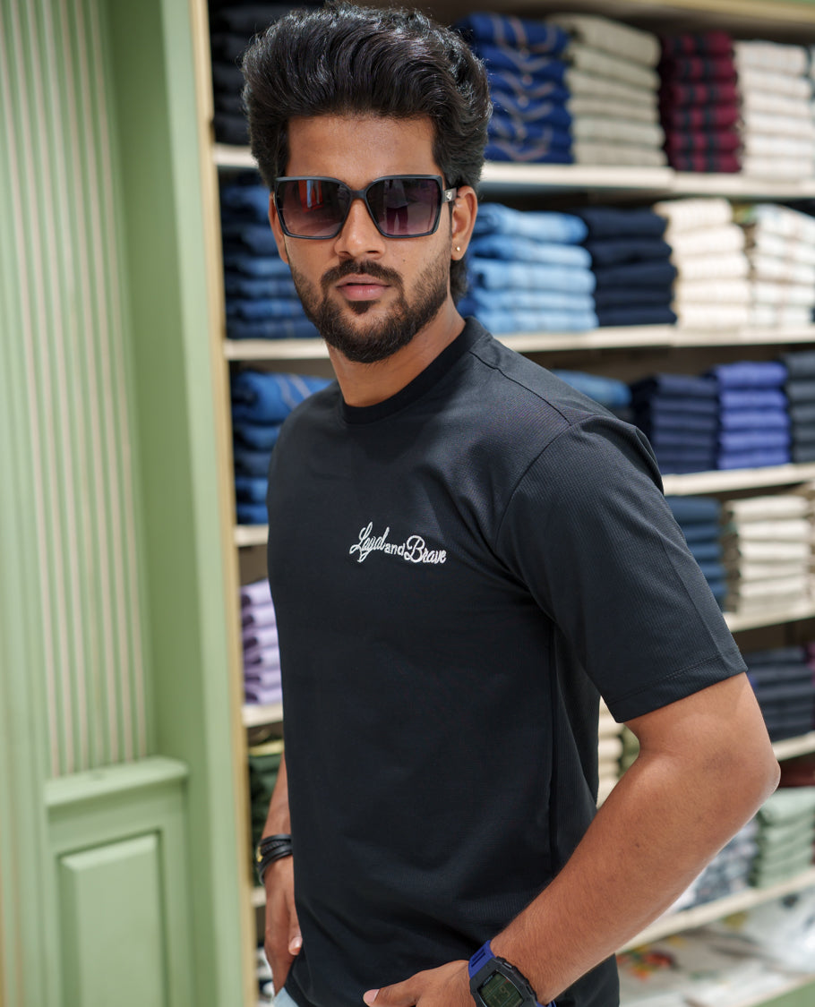 Black Cotton-Blended T-shirt, Comes with a Unique Back Print, Half-sleeves, Crew Neck, Oversized Fit, and Regular Length