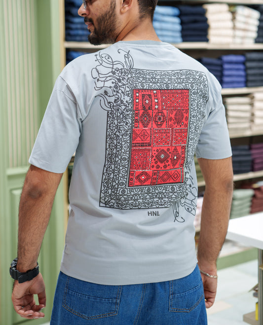 Grey Cotton-Blended T-shirt, Features Unique Back Print, Half-sleeves, Crew Neck, Oversized Fit, and Regular Length 