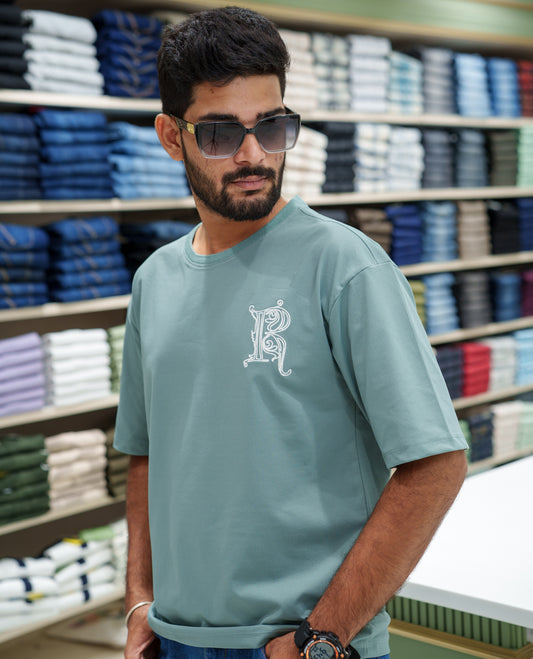 Teal Cotton-Blended T-shirt, Comes with a Unique Back Print, Half-sleeves, Crew Neck, Oversized Fit, and Regular Length