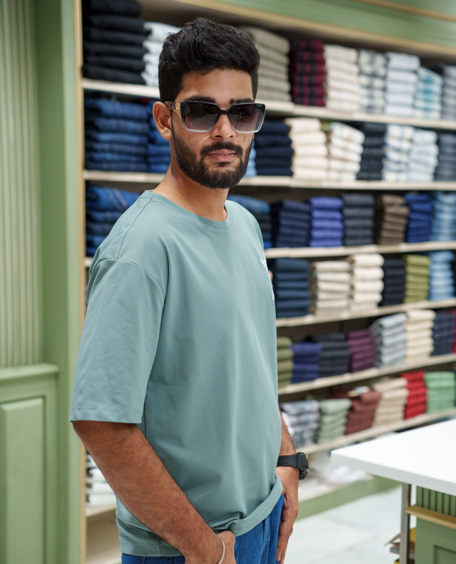 Teal Cotton-Blended T-shirt, Comes with a Unique Back Print, Half-sleeves, Crew Neck, Oversized Fit, and Regular Length
