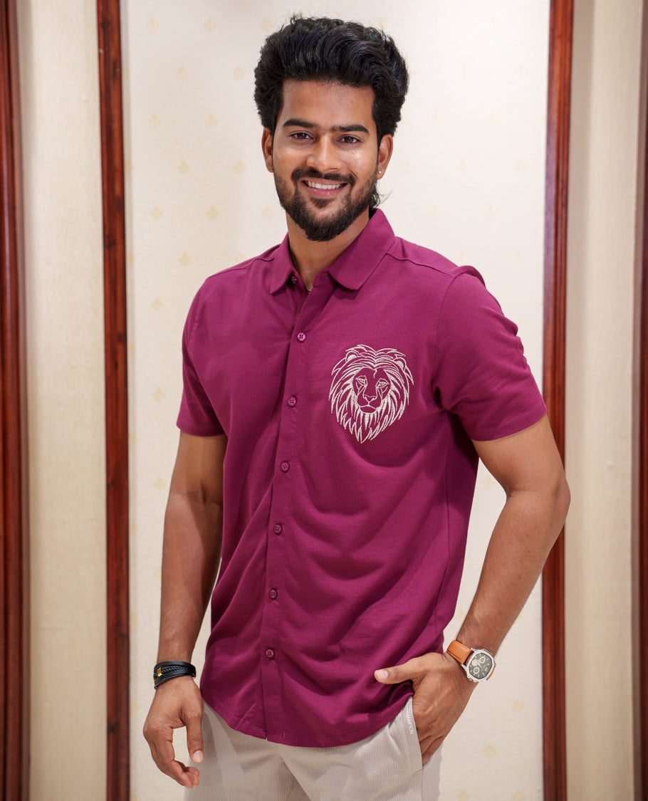 Maroon Fancy Knitted Casual Shirt, Comes with Lion Motifs Embroidery, a Spread Collar, Half Sleeves, Regular Fit, and Regular Length