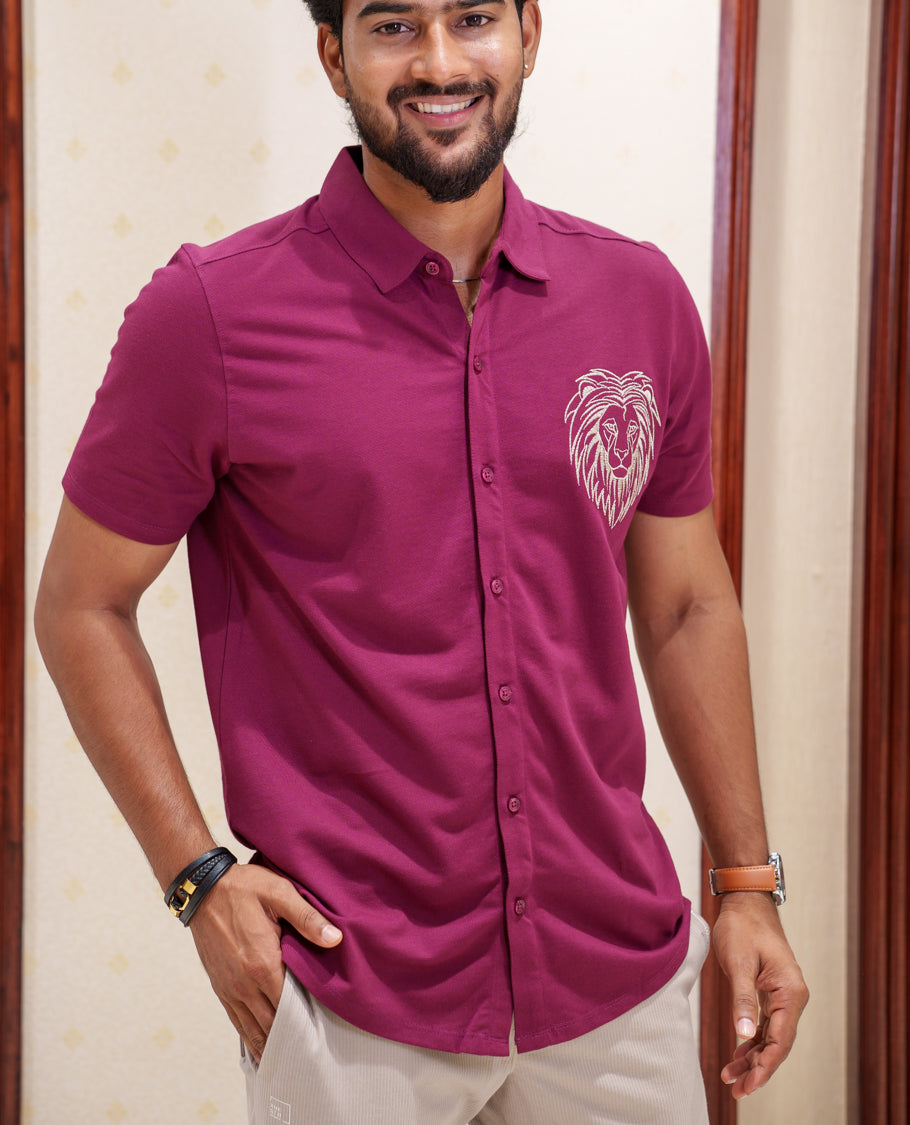 Maroon Fancy Knitted Casual Shirt, Comes with Lion Motifs Embroidery, a Spread Collar, Half Sleeves, Regular Fit, and Regular Length