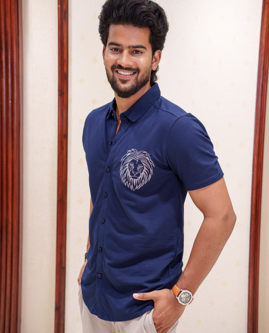 Blue Fancy Knitted Casual Shirt, Comes with Lion Motifs Embroidery, a Spread Collar, Half Sleeves, Regular Fit, and Regular Length