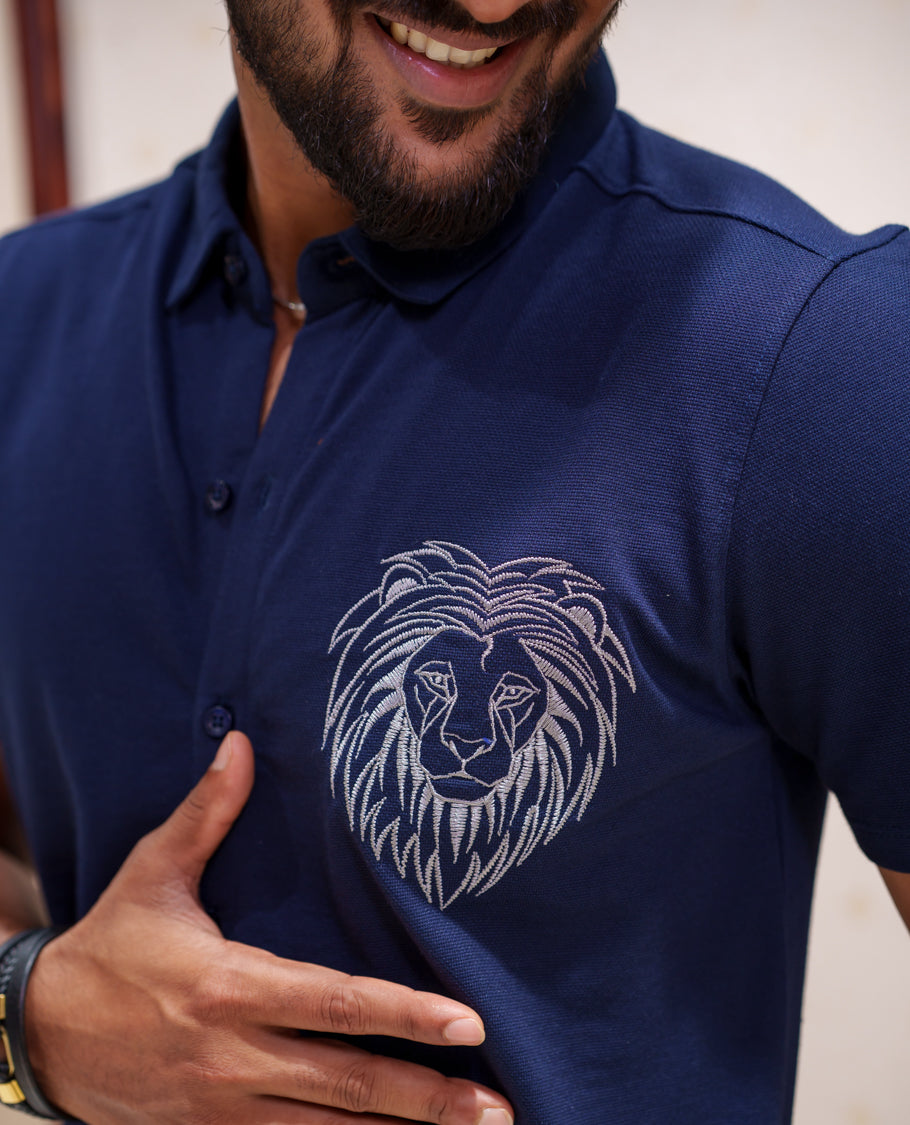 Blue Fancy Knitted Casual Shirt, Comes with Lion Motifs Embroidery, a Spread Collar, Half Sleeves, Regular Fit, and Regular Length