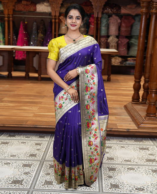 Purple floral buttas art silk paithani saree, contrast floral, bird, and muniya border, pallu of floral and bird designs and a matching blouse