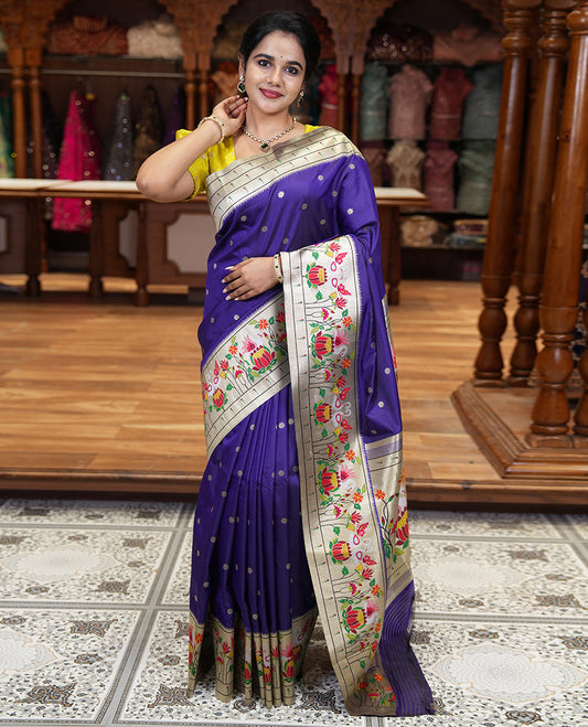Purple floral buttas art silk paithani saree, contrast floral, bird, and muniya border, pallu of floral and bird designs and a matching blouse