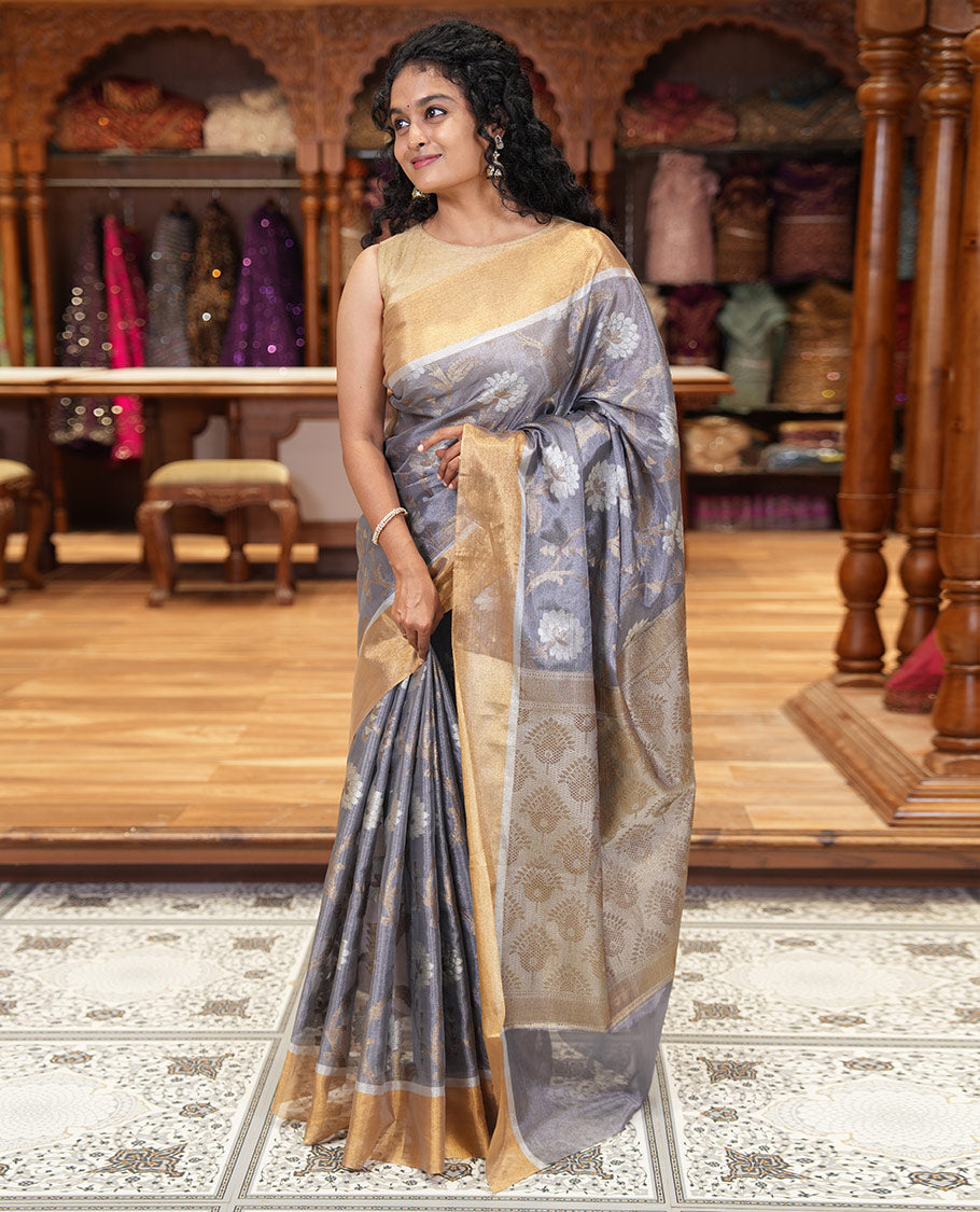 Grey floral jaal jacquard tissue silk saree, contrast bavanji border, floral design pallu, and a scallop design blouse