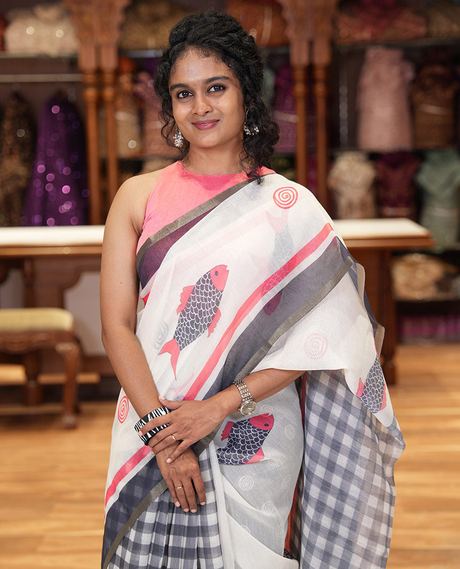 Off-white fish motifs and checked half-and-half saree, contrast border, checked pallu, and a contrast spiral motifs printed blouse