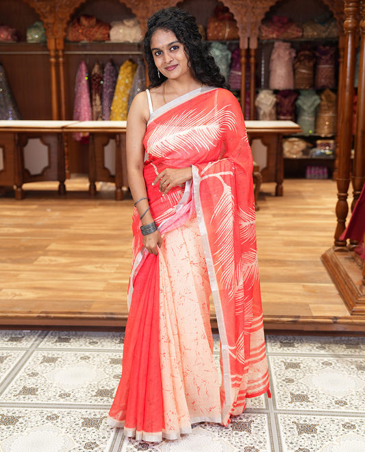 Peach tropical leaf motifs batik printed linen cotton saree, piping border, batik printed pallu and a contrast batik printed blouse