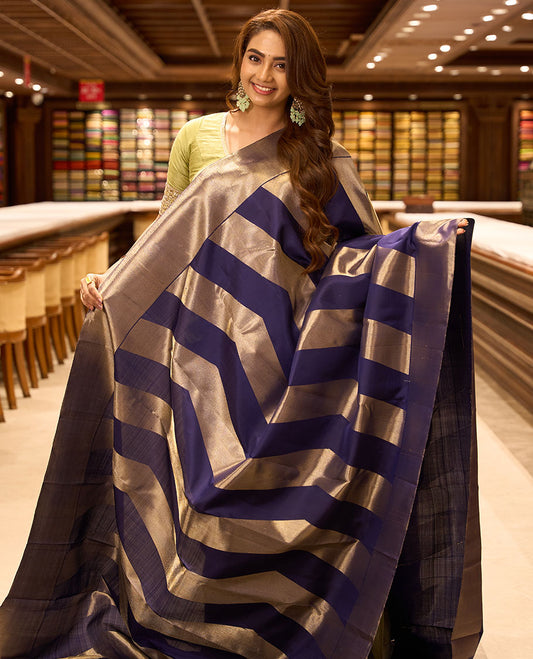 Blue thick zig-zag striped kancheepuram silksaree, getti zari border & zari-rich pallu of pillaiyar mokku & seeppu rekku