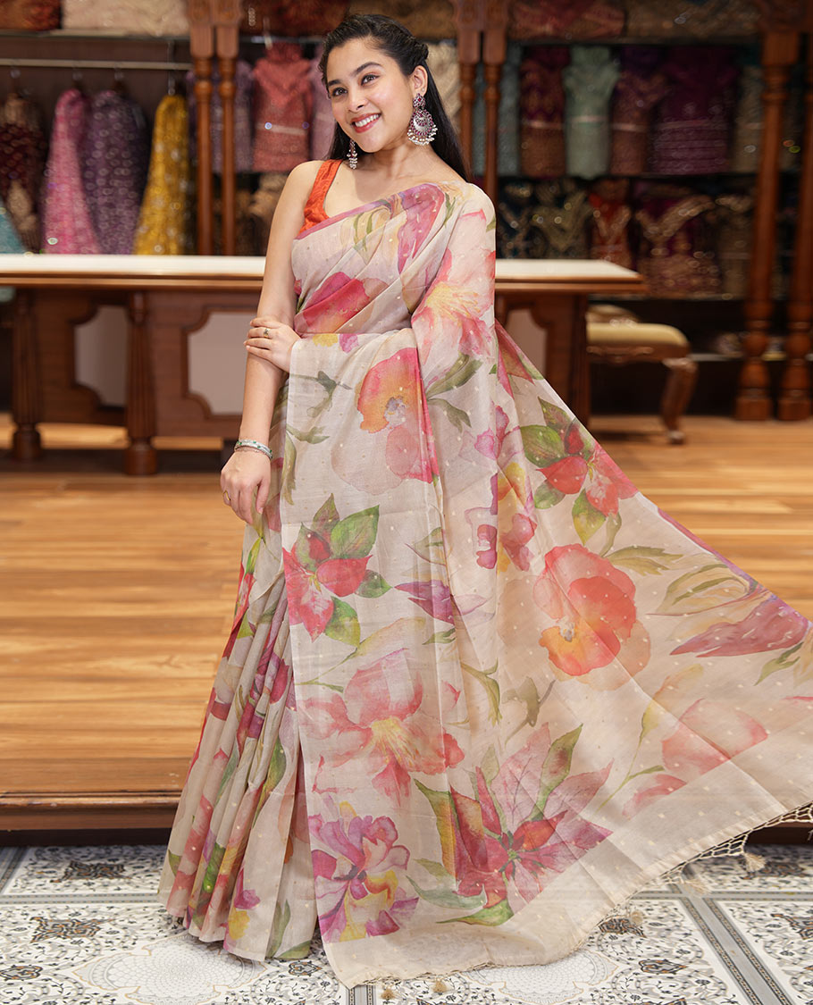 Borderless chikku-base colorful floral printed with buttas fancy tussar saree with a matching printed and zari work blouse