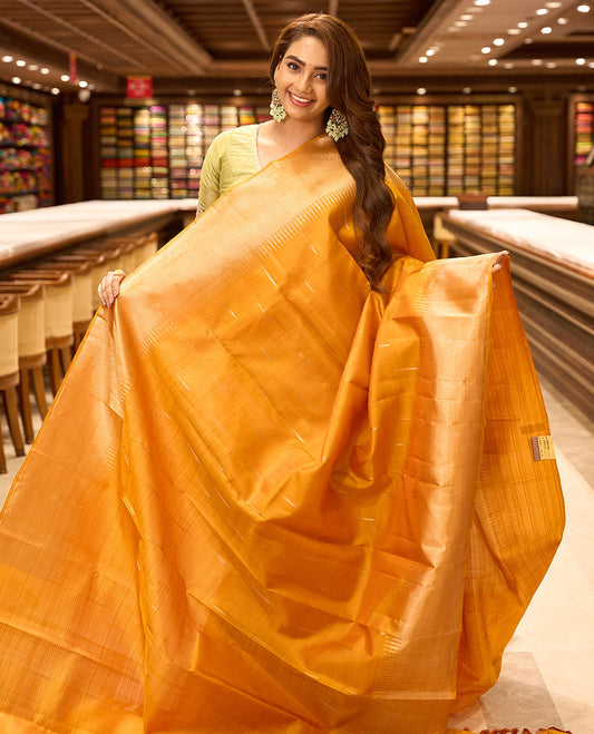 Orange malli mokku kancheepuram silk saree, thazampoo rekku zari border & zari-rich striped pallu