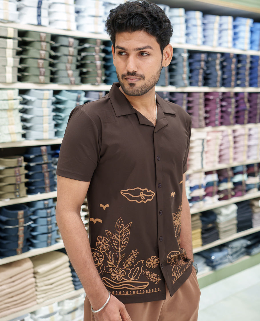 Brown Cotton-Blended Casual Shirt Comes with a Tropical Floral Embroidery, a Cuban Collar Neck, Half Sleeves, a Regular Fit, and Regular Length