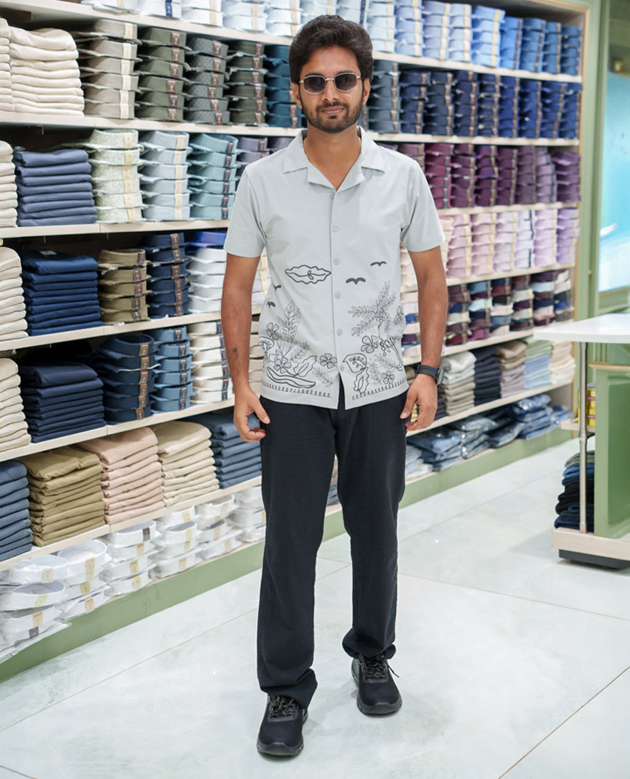 Grey Cotton-Blended Casual Shirt Comes with a Tropical Floral Embroidery, a Cuban Collar Neck, Half Sleeves, a Regular Fit, and Regular Length