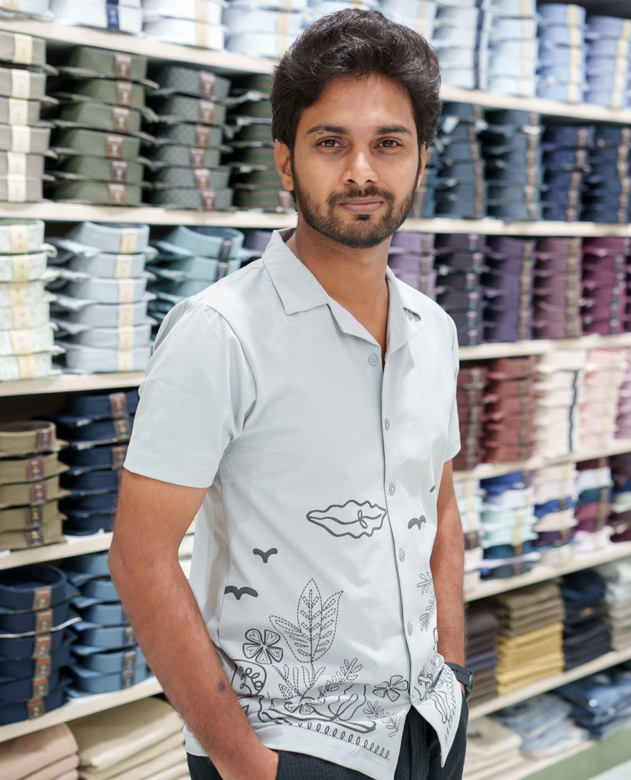 Grey Cotton-Blended Casual Shirt Comes with a Tropical Floral Embroidery, a Cuban Collar Neck, Half Sleeves, a Regular Fit, and Regular Length