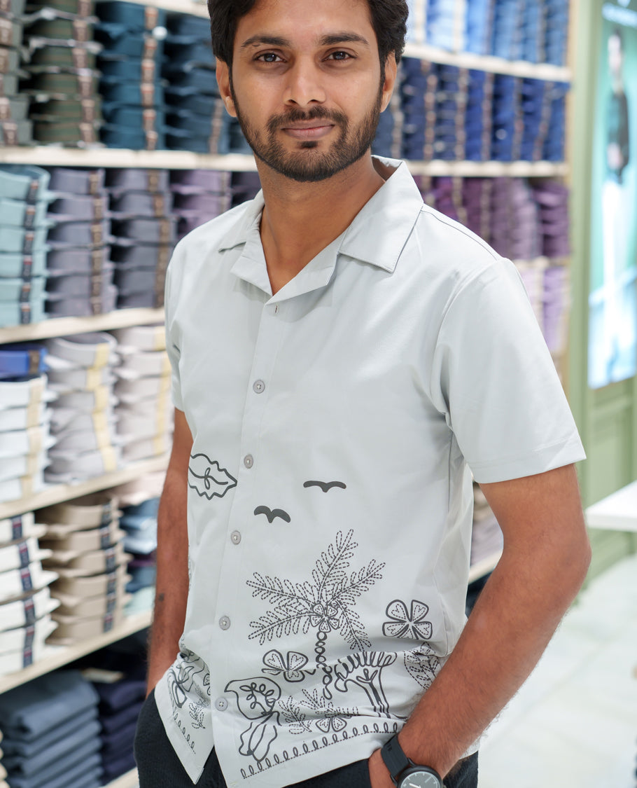 Grey Cotton-Blended Casual Shirt Comes with a Tropical Floral Embroidery, a Cuban Collar Neck, Half Sleeves, a Regular Fit, and Regular Length