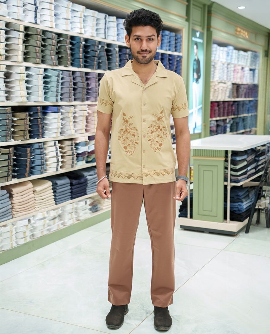 Cream Cotton-Blended Casual Shirt Comes with a Floral Embroidery, a Cuban Collar Neck, Half Sleeves, a Regular Fit, and Regular Length