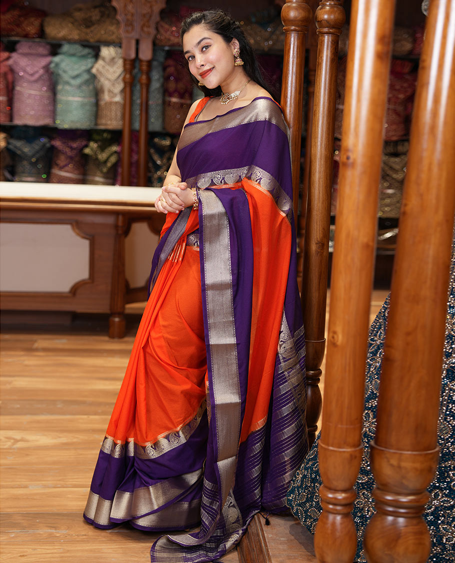 Orange plain fancy Mysore silk saree, contrast rettai-pettu traditional zari border of peacock and paisleys, zari striped pallu, and a contrast zari design blouse