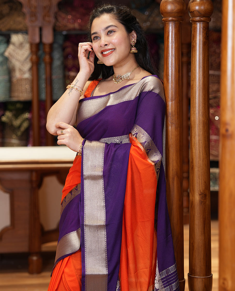 Orange plain fancy Mysore silk saree, contrast rettai-pettu traditional zari border of peacock and paisleys, zari striped pallu, and a contrast zari design blouse