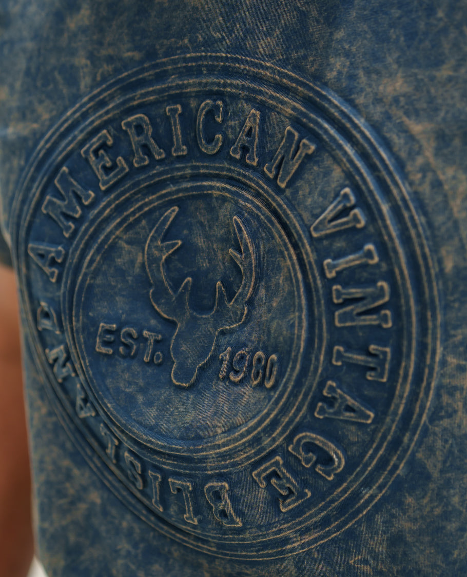 Dark Blue Cotton-Blended Acid-Washed Oversized T-Shirt Comes with a Typographic-Embossed, a Crew Neck, Half Sleeves, and Regular Length
