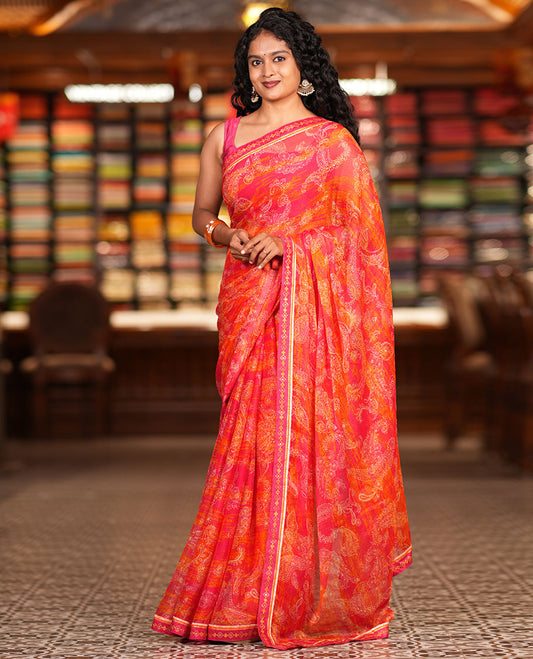 Rani Pink Chiffon Saree, Steeped in Richness of Paisleys, a Subtle Border, a Contrast Blouse
