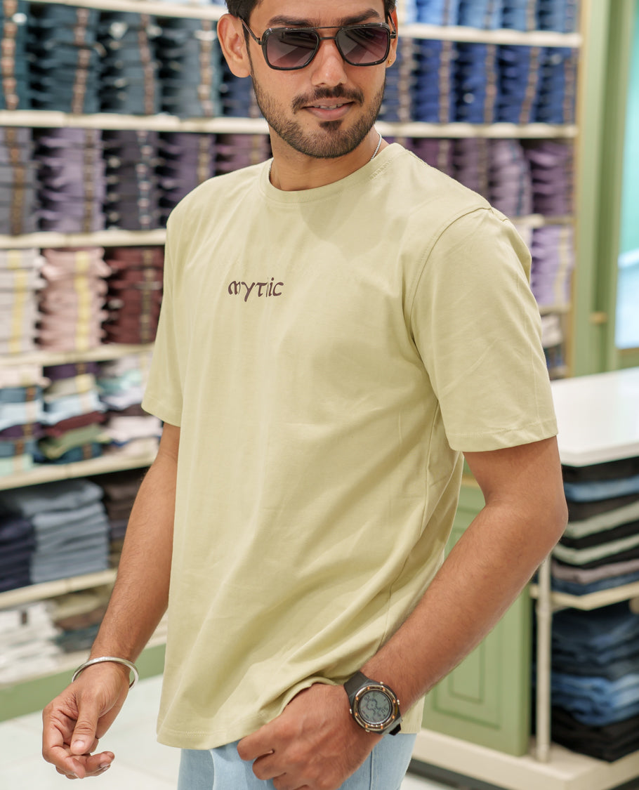 Cream Cotton-Blended T-Shirt Comes with an Deer-Motifs Back Print, Crew Neck, Half Sleeves, Oversized Fit, and Regular Length