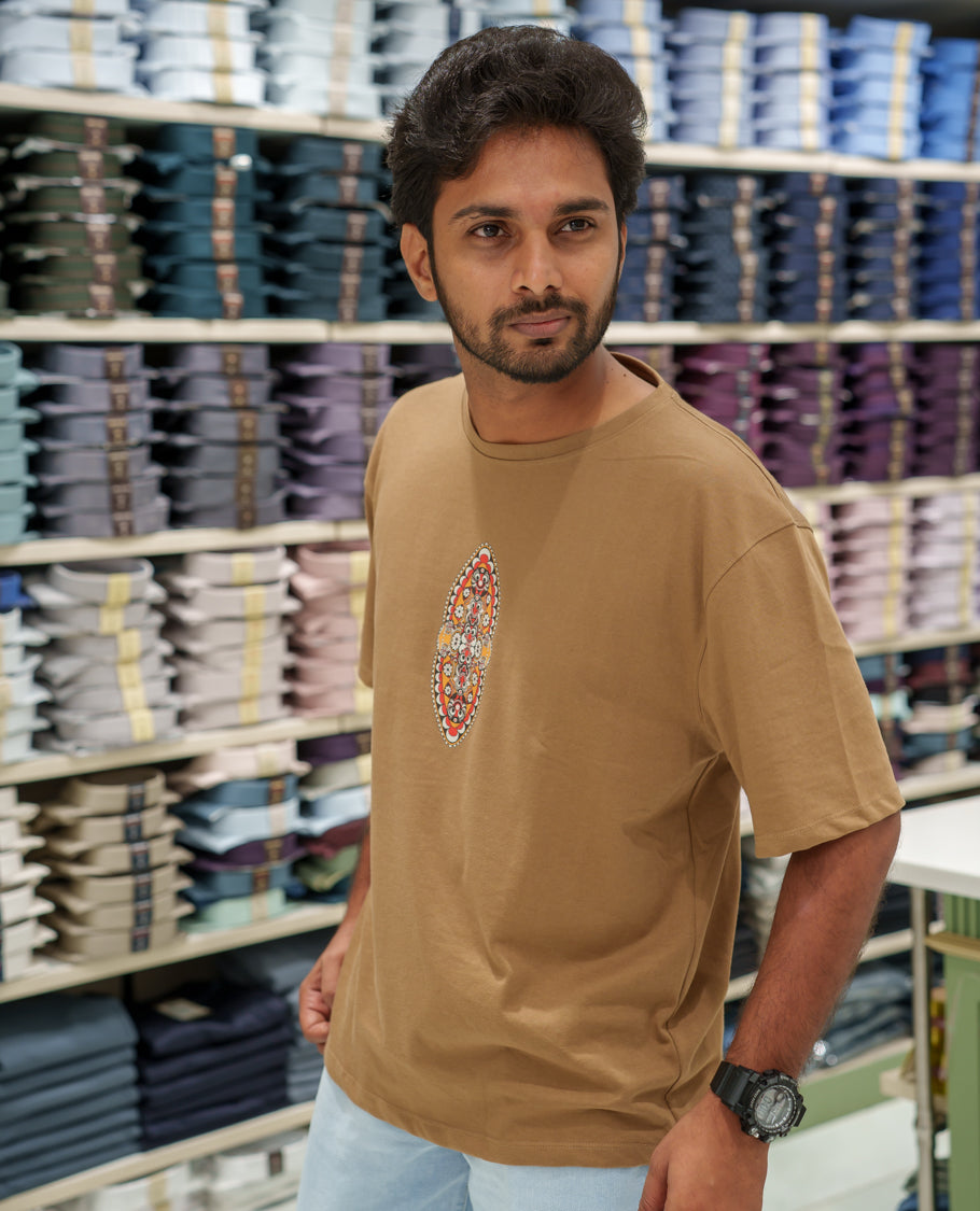 Brown Cotton-Blended T-Shirt Comes with an Evil-Themed Back Print, Crew Neck, Half Sleeves, Oversized Fit, and Regular Length