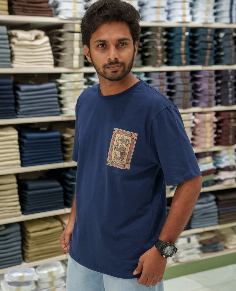 Navy Cotton-Blended T-Shirt Comes with an Tribe-Motifs Back Print, Crew Neck, Half Sleeves, Oversized Fit, and Regular Length