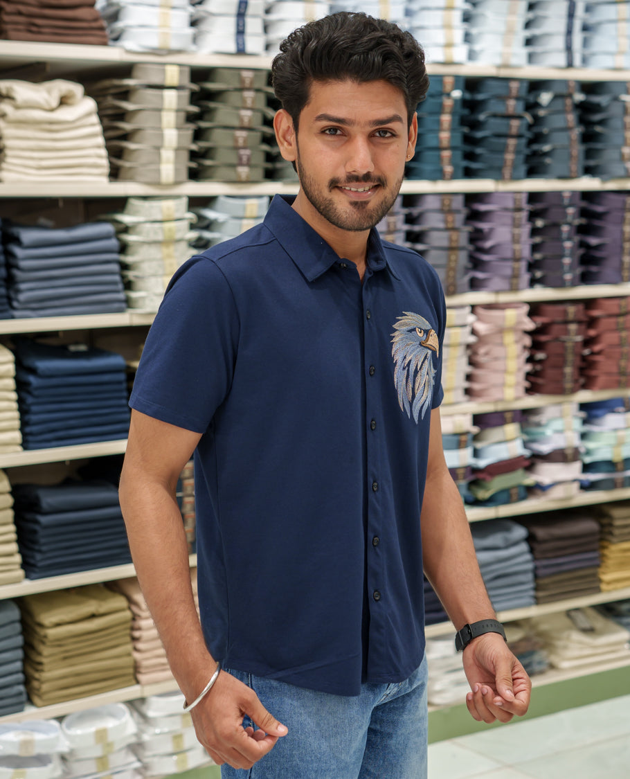 Navy Blue Cotton-Blended Casual Shirt Comes with Eagle Motif Embroidery, Spread Collar, Half Sleeves, Regular Fit, and Regular Length