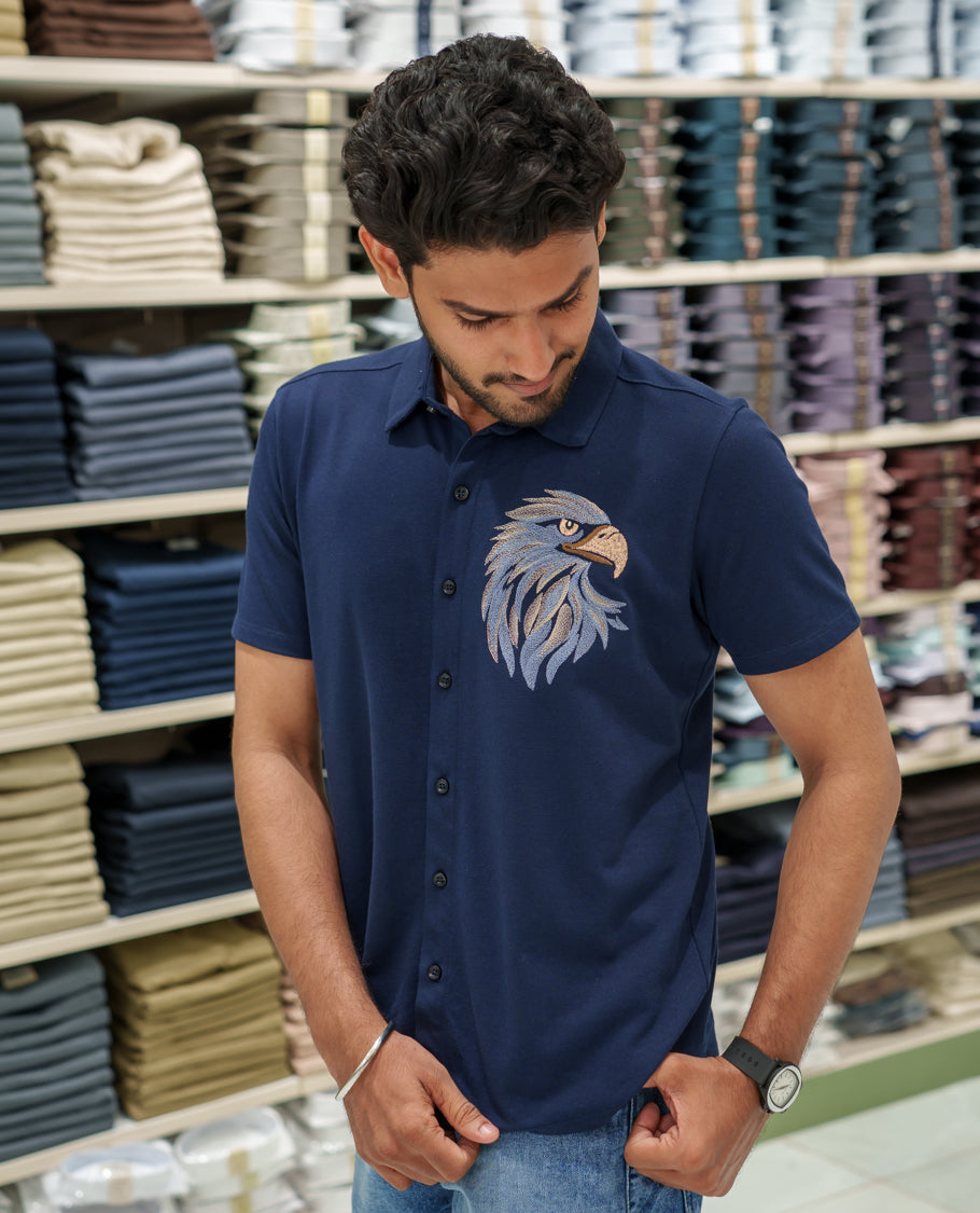 Navy Blue Cotton-Blended Casual Shirt Comes with Eagle Motif Embroidery, Spread Collar, Half Sleeves, Regular Fit, and Regular Length