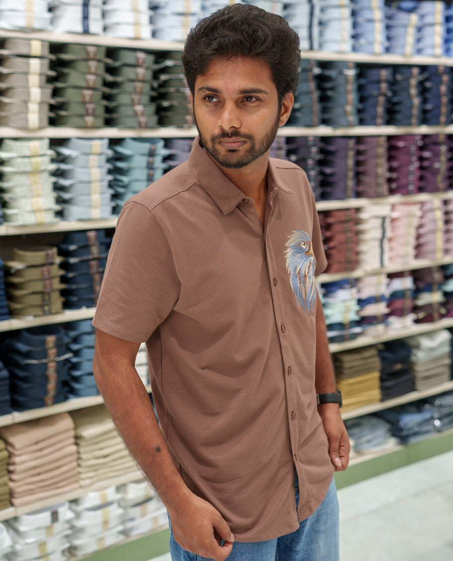 Brown Cotton-Blended Casual Shirt Comes with Eagle Motif Embroidery, Spread Collar, Half Sleeves, Regular Fit, and Regular Length