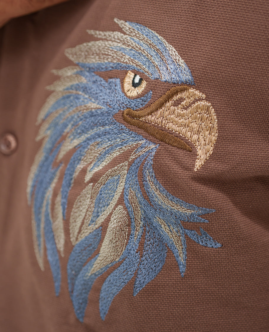 Brown Cotton-Blended Casual Shirt Comes with Eagle Motif Embroidery, Spread Collar, Half Sleeves, Regular Fit, and Regular Length