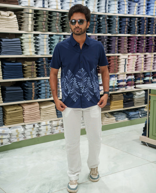 Navy Blue Cotton-Blended Casual Shirt Comes with Tropical Floral Print, Spread Collar, Half Sleeves, Regular Fit, and Regular Length