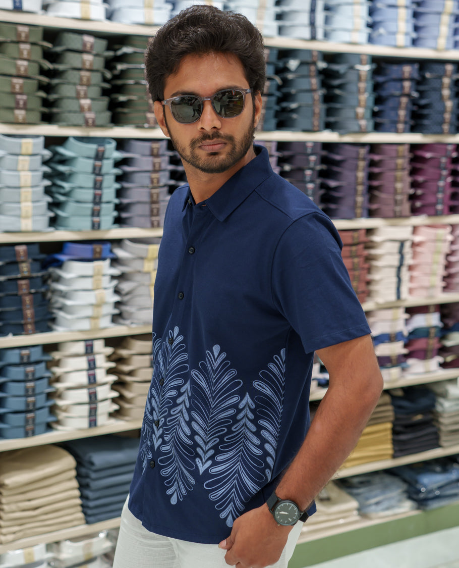 Navy Blue Cotton-Blended Casual Shirt Comes with Tropical Floral Print, Spread Collar, Half Sleeves, Regular Fit, and Regular Length