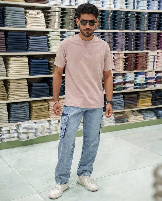 Pink Cotton-Blended Lava-Wash T-Shirt Comes with a Typographic Print, Crew Neck, Half Sleeves, Oversized Fit, and Regular Length