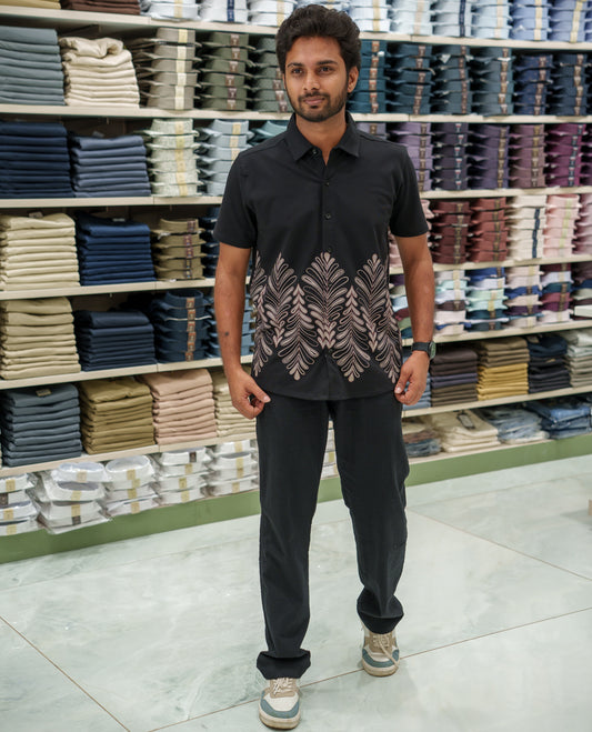 Black Cotton-Blended Casual Shirt Comes with Tropical Floral Print, Spread Collar, Half Sleeves, Regular Fit, and Regular Length