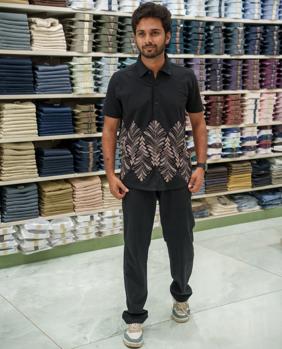 Black Cotton-Blended Casual Shirt Comes with Tropical Floral Print, Spread Collar, Half Sleeves, Regular Fit, and Regular Length