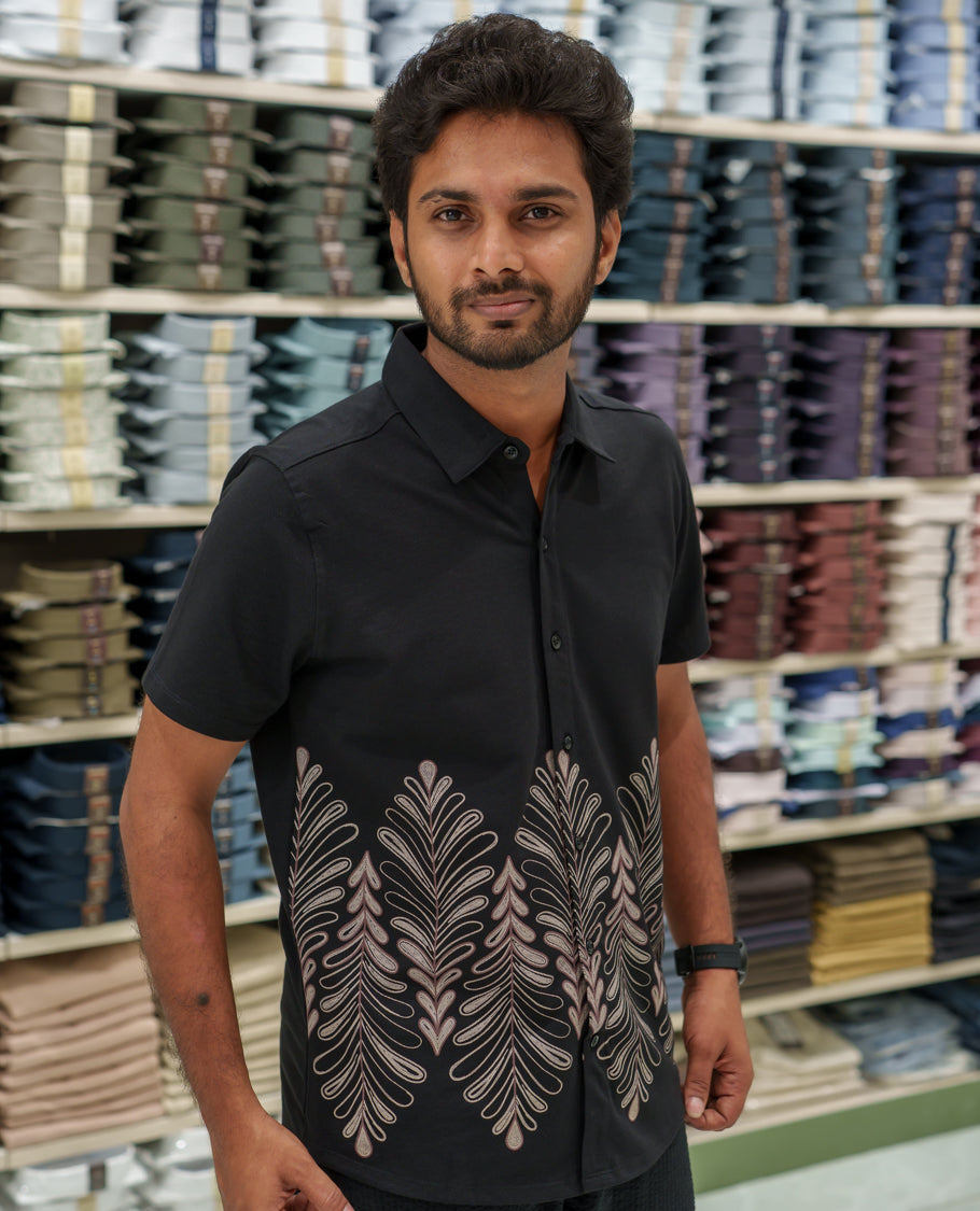 Black Cotton-Blended Casual Shirt Comes with Tropical Floral Print, Spread Collar, Half Sleeves, Regular Fit, and Regular Length