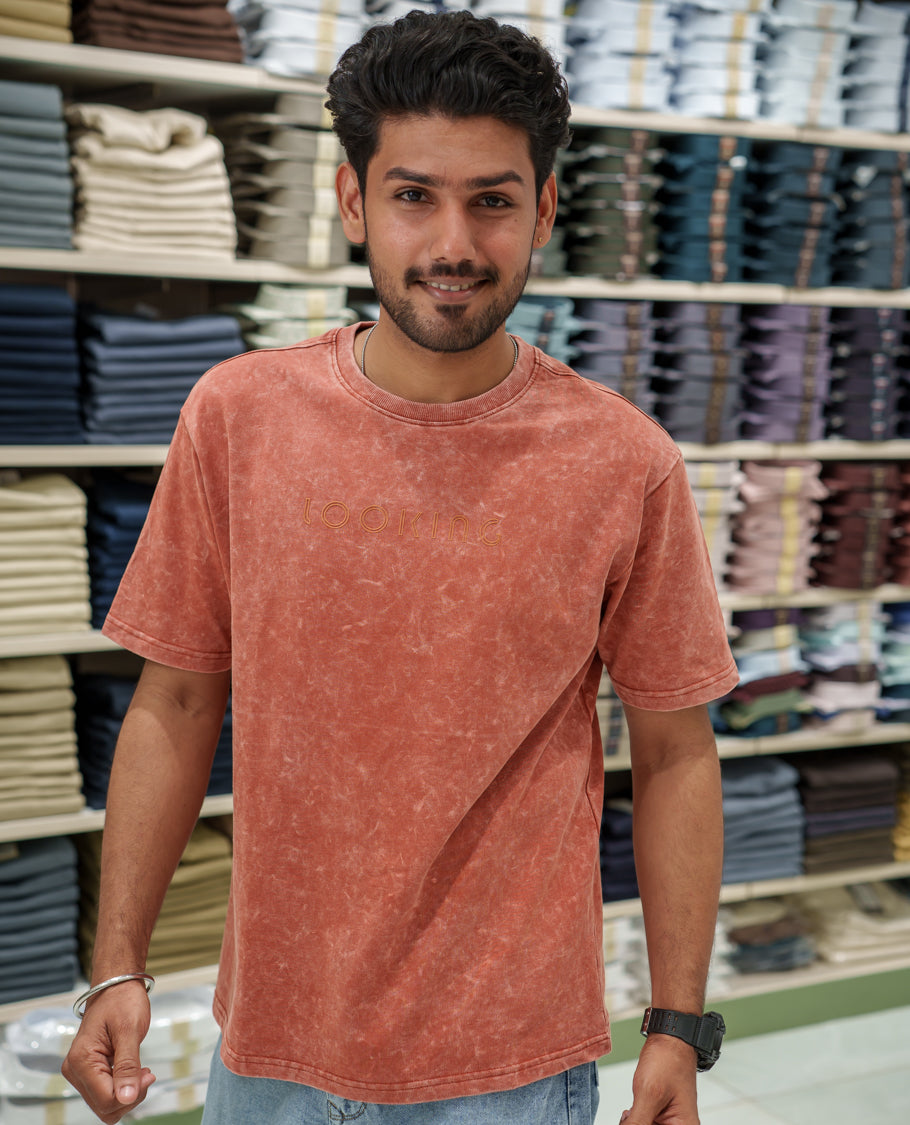 Orange Cotton-Blended Lava-Wash T-Shirt Comes with a Typographic Print, Crew Neck, Half Sleeves, Oversized Fit, and Regular Length