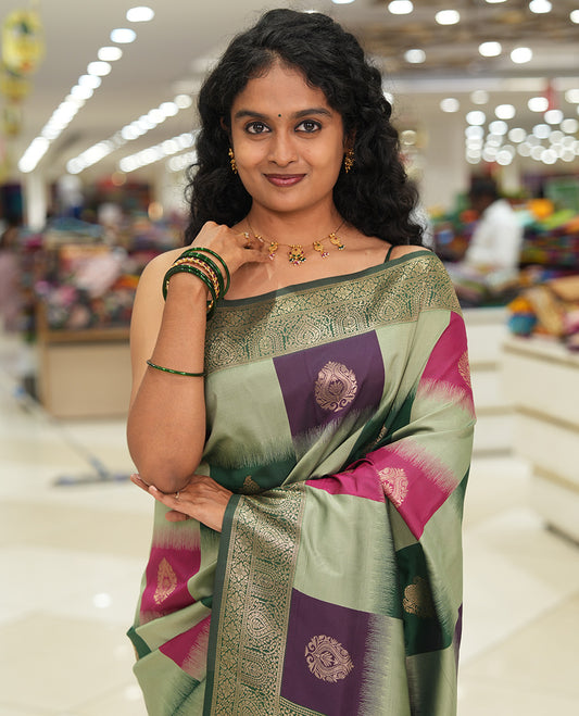 Green Elite Soft Silk Saree, Adorned with Zari Buttas and Checks, a Contrast Traditional Border, Grand Pallu, and a Contrast Blouse