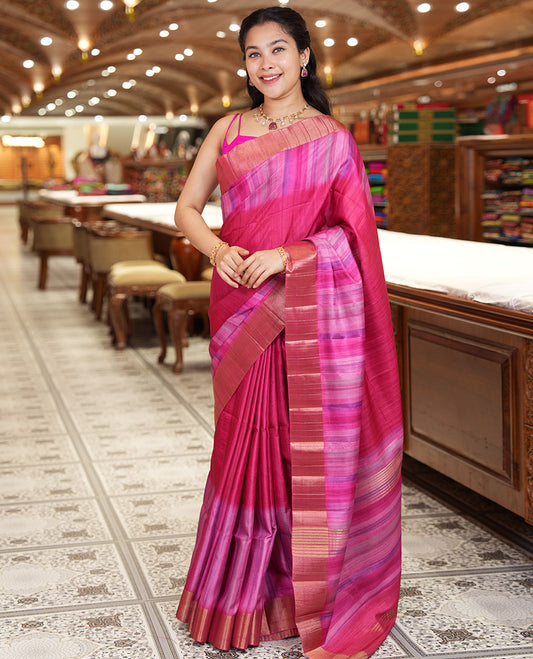 Pink Plain Fancy Tussar Saree, Highlighted by a Zari Bavanji Handbrush Painting-Style Striped Border, Striped Pallu, and Paired with a Matching Blouse