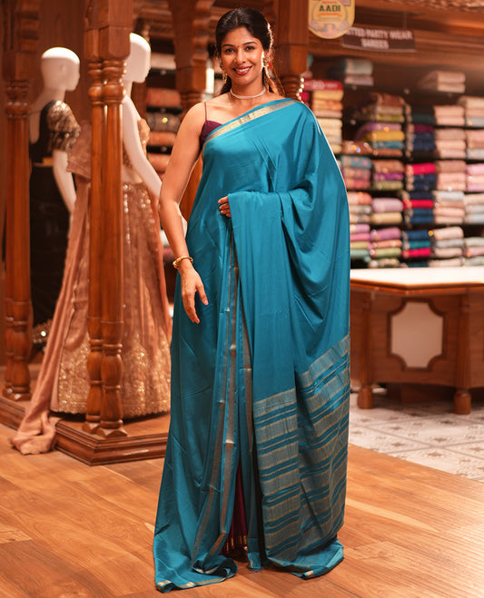 Rama Blue Plain Semi-Mysore Saree, a Zari Elephant-Peacock Butta Border, Striped Pallu, Matching Blouse